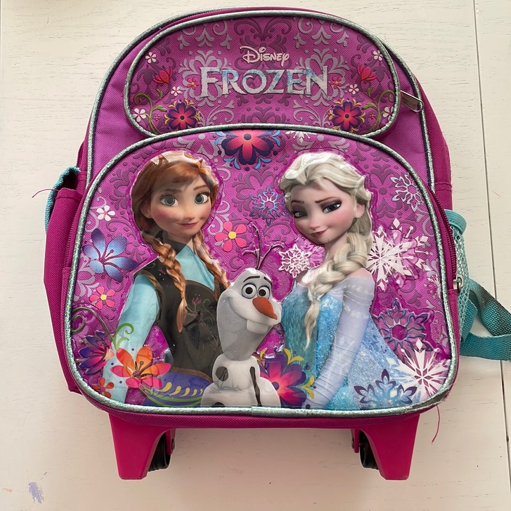 Frozen rolling backpack in good used condition